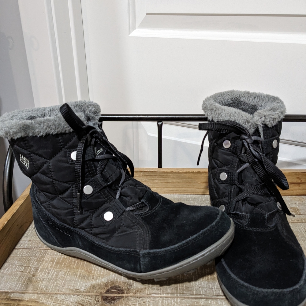 Women's Black Columbia waterproof boots.